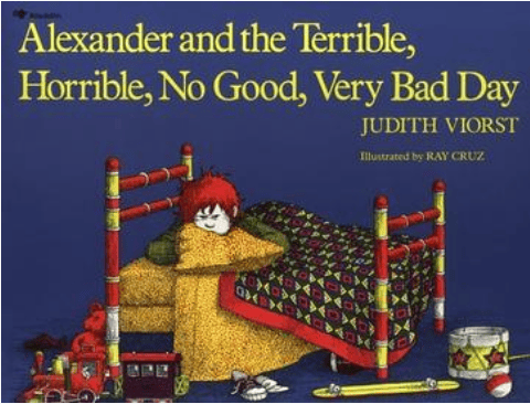 Cover of the children's book 'Alexander and the Terrible, Horrible, No Good, Very Bad Day' by Judith Viorst, illustrated by Ray Cruz. It features a boy with red hair sitting under a colorful blanket in a bedroom setting.